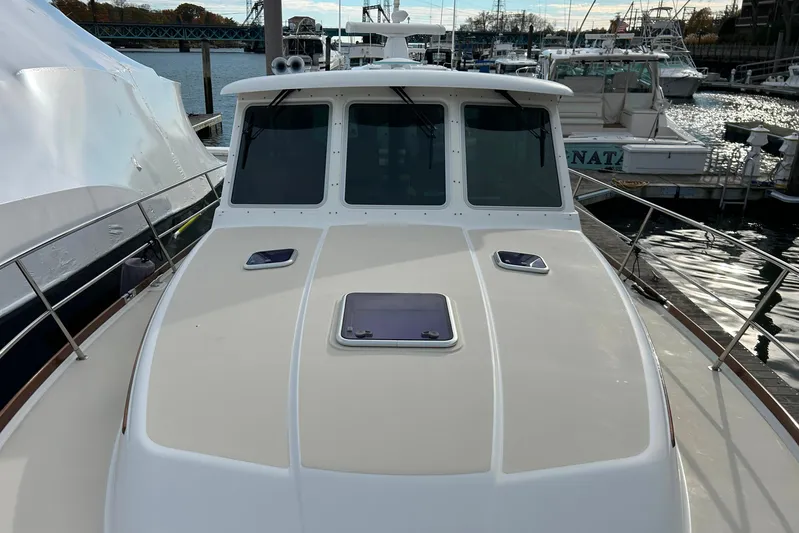  Yacht Photos Pics 2017 Sabre 42 Salon Express yacht docked at marina, front deck view.