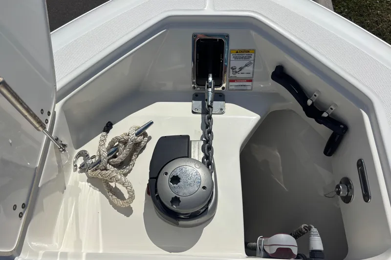  Yacht Photos Pics Anchor compartment of 2021 Boston Whaler 330 Outrage with rope and chain.