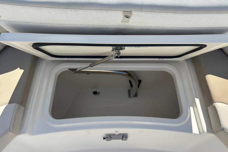  Yacht Photos Pics Open storage compartment on a 2021 Boston Whaler 330 Outrage boat.