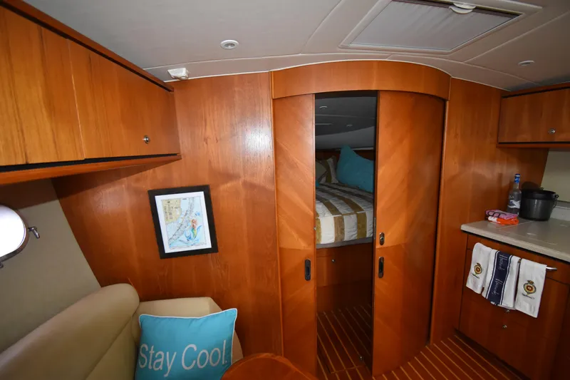  Yacht Photos Pics 2008 Tiara Yachts 39 Sovran interior with wood finish and cozy cabin.