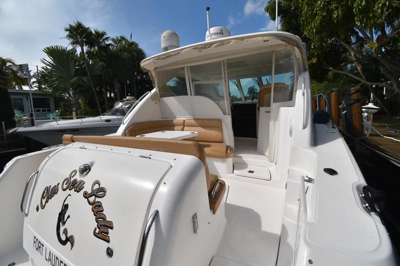  Yacht Photos Pics 2008 Tiara Yachts 39 Sovran docked, featuring spacious seating and sleek design.