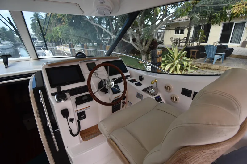  Yacht Photos Pics 2008 Tiara Yachts 39 Sovran helm with leather seat and modern controls.