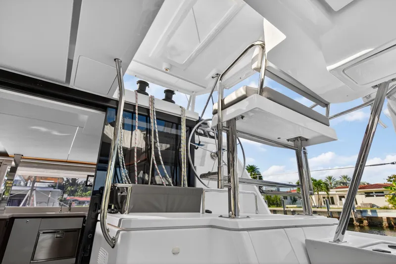  Yacht Photos Pics 2022 Leopard 45 yacht interior with modern helm and sleek design elements.