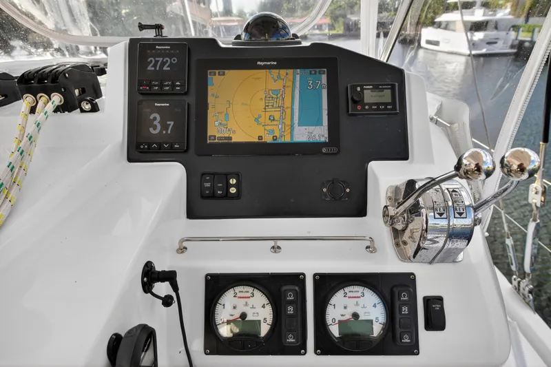  Yacht Photos Pics Control panel of a 2022 Leopard 45 catamaran with navigation and engine displays.