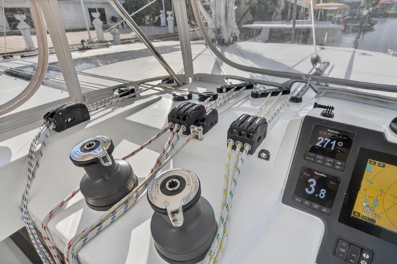  Yacht Photos Pics Control panel of a 2022 Leopard 45 catamaran with navigation instruments and winches.