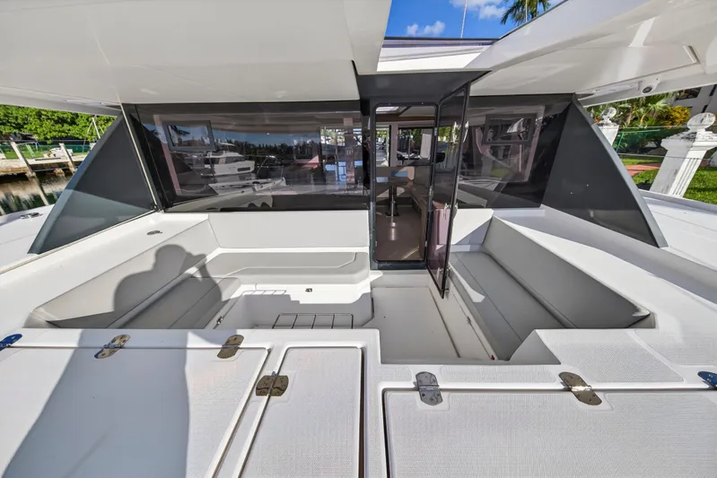  Yacht Photos Pics 2022 Leopard 45 yacht cockpit with spacious seating and modern design.