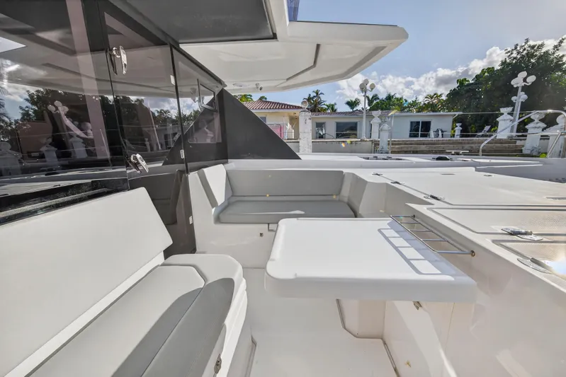  Yacht Photos Pics 2022 Leopard 45 yacht interior with sleek seating and modern design.