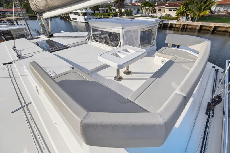  Yacht Photos Pics Luxurious 2022 Leopard 45 catamaran with spacious deck seating and modern design.