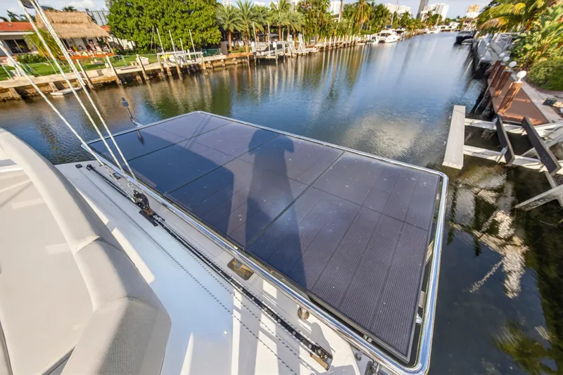  Yacht Photos Pics Solar panel on 2022 Leopard 45 yacht docked by a scenic canal.