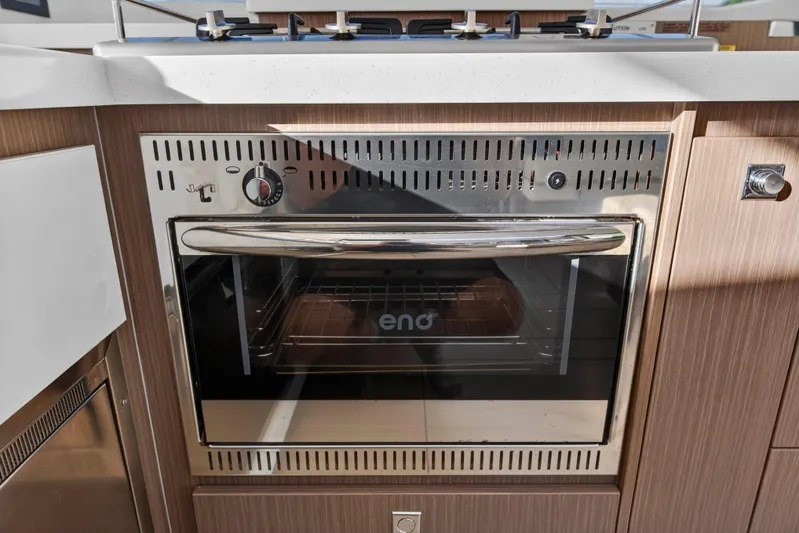  Yacht Photos Pics Modern kitchen oven in 2022 Leopard 45 yacht, featuring stainless steel design and sleek controls.