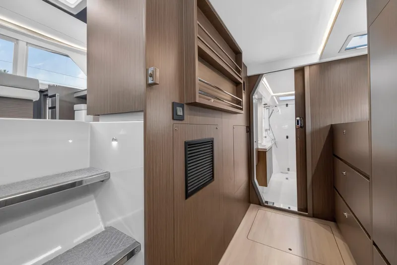  Yacht Photos Pics Interior of 2022 Leopard 45 yacht, featuring modern wood cabinetry and sleek design elements.