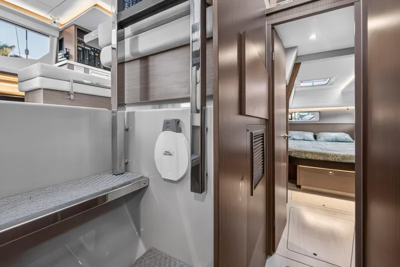 Yacht Photos Pics Interior of 2022 Leopard 45 yacht, featuring modern design and cozy bedroom.