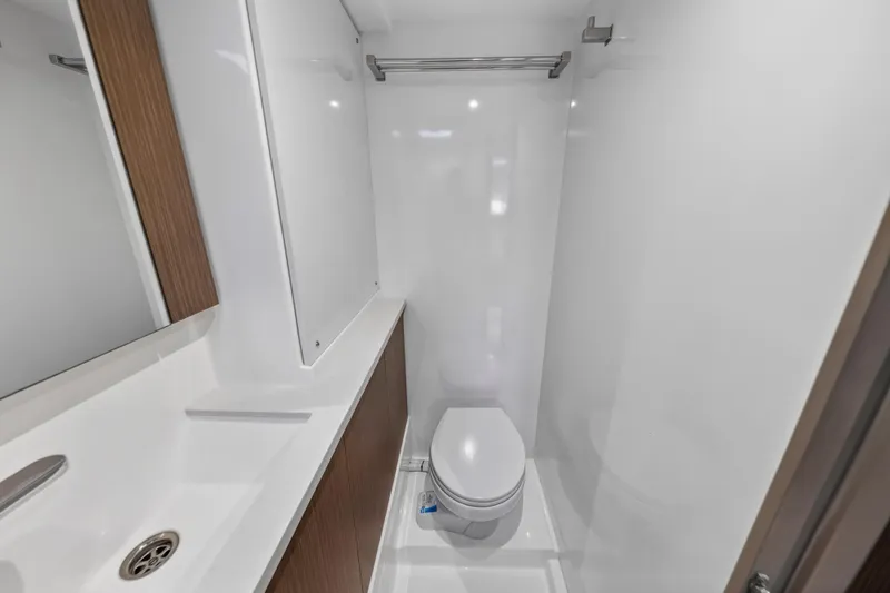  Yacht Photos Pics Modern bathroom in 2022 Leopard 45 yacht, featuring sleek design and compact layout.