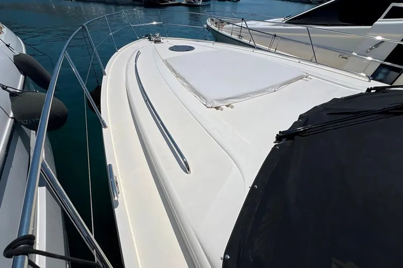  Yacht Photos Pics 2010 Princess V62 yacht deck with sleek design and stainless steel railings.