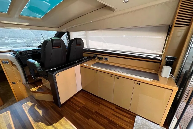  Yacht Photos Pics Luxurious interior of 2010 Princess V62 yacht with sleek design and modern amenities.