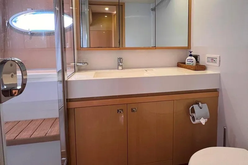  Yacht Photos Pics Luxurious bathroom interior of 2010 Princess V62 yacht with modern fixtures.