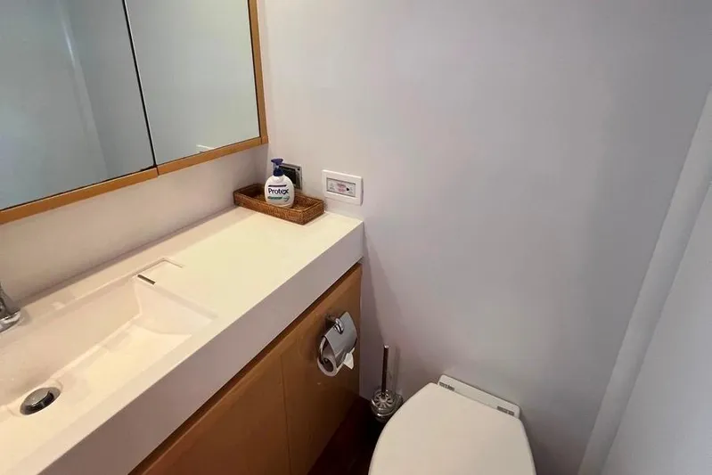  Yacht Photos Pics Bathroom interior of 2010 Princess V62 yacht with modern sink and toilet.