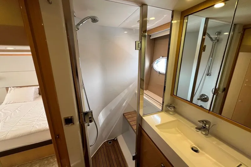  Yacht Photos Pics Luxurious bathroom interior of 2010 Princess V62 yacht with shower and vanity.