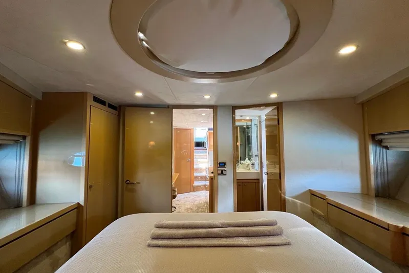  Yacht Photos Pics Luxurious interior of 2010 Princess V62 yacht cabin with modern design and ambient lighting.