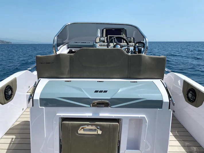  Yacht Photos Pics 2025 Ranieri NEXT 285 XL boat, sleek design, open sea, modern dashboard, luxury seating.