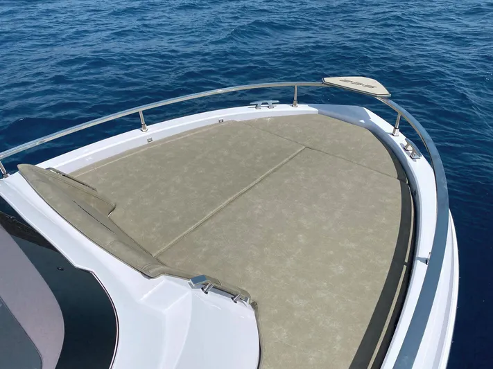  Yacht Photos Pics 2025 Ranieri NEXT 285 XL boat deck on calm blue sea.
