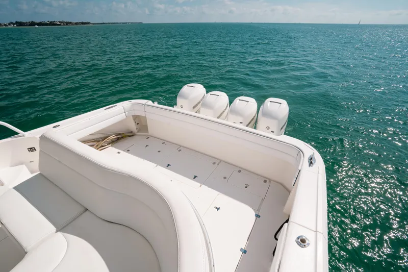  Yacht Photos Pics 2009 Intrepid 475 Sport Yacht on open water, featuring spacious deck and powerful engines.