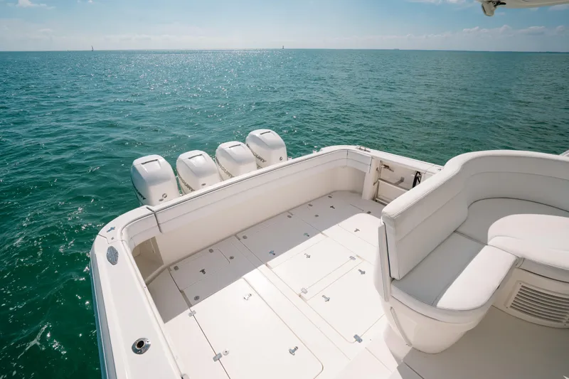  Yacht Photos Pics 2009 Intrepid 475 Sport Yacht deck with ocean view and seating area.