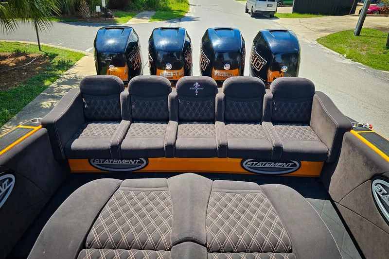  Yacht Photos Pics Luxurious seating on 2016 Statement 380 Open boat with powerful engines in the background.