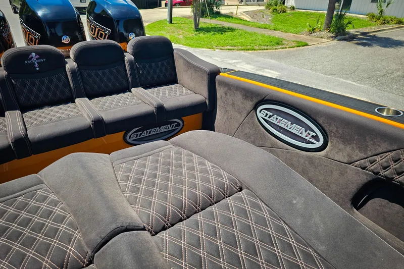  Yacht Photos Pics Luxurious seating on a 2016 Statement 380 Open boat with stylish diamond stitching.