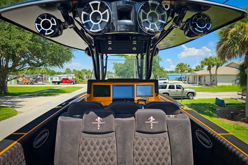  Yacht Photos Pics Interior view of 2016 Statement 380 Open boat with advanced dashboard and sound system.