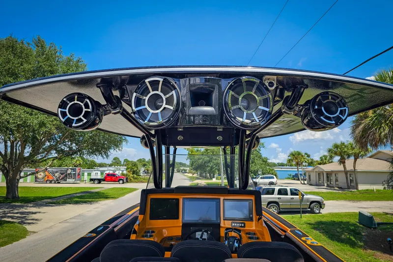  Yacht Photos Pics 2016 Statement 380 Open boat with advanced audio system and navigation screens.