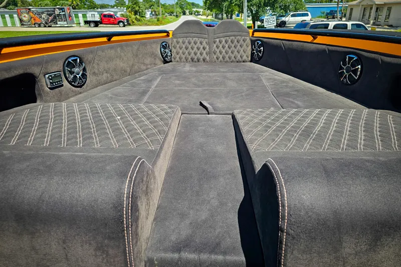  Yacht Photos Pics Luxurious interior of 2016 Statement 380 Open boat with plush seating and speakers.