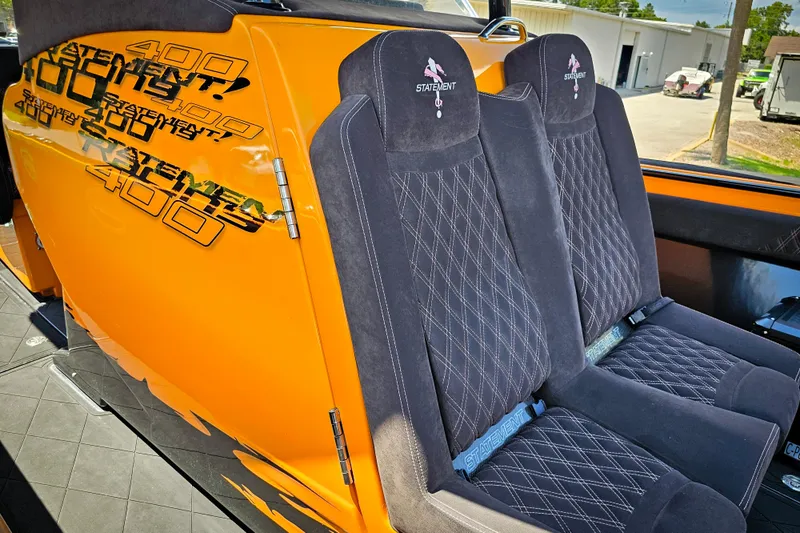  Yacht Photos Pics Orange Statement 380 Open 2016 boat interior with black diamond-stitched seats.