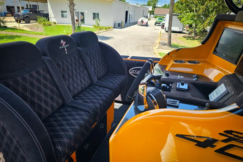  Yacht Photos Pics Interior of 2016 Statement 380 Open boat with luxurious seating and modern controls.