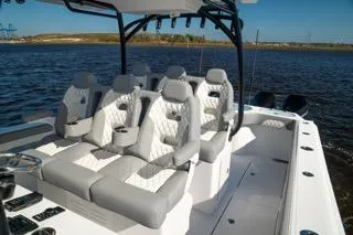  Yacht Photos Pics 2026 Front Runner 37 Catamaran with luxurious seating on a calm water backdrop.