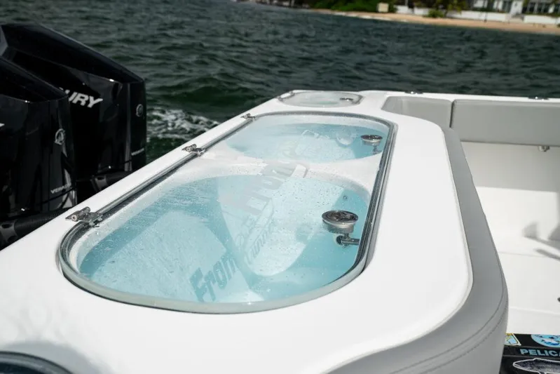  Yacht Photos Pics 2026 Front Runner 37 Catamaran with livewell, featuring dual Mercury outboard engines.