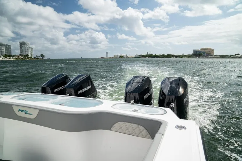  Yacht Photos Pics 2026 Front Runner 37 Catamaran with four Mercury outboard engines on open water.