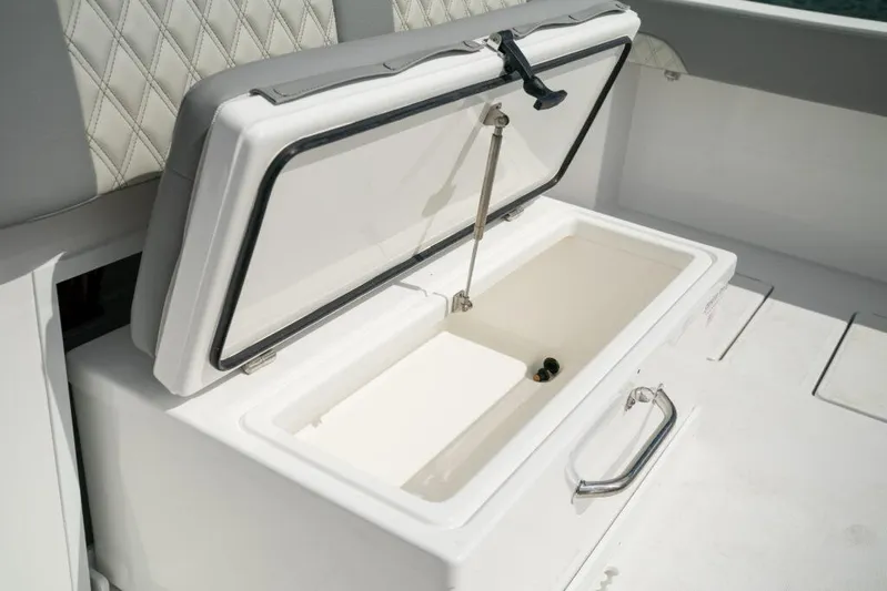  Yacht Photos Pics Open storage compartment on 2026 Front Runner 37 Catamaran boat deck.