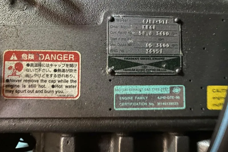 Free Spirits Yacht Photos Pics Yanmar diesel engine warning labels on Jeanneau Sun Odyssey 45.2, 2000 model.