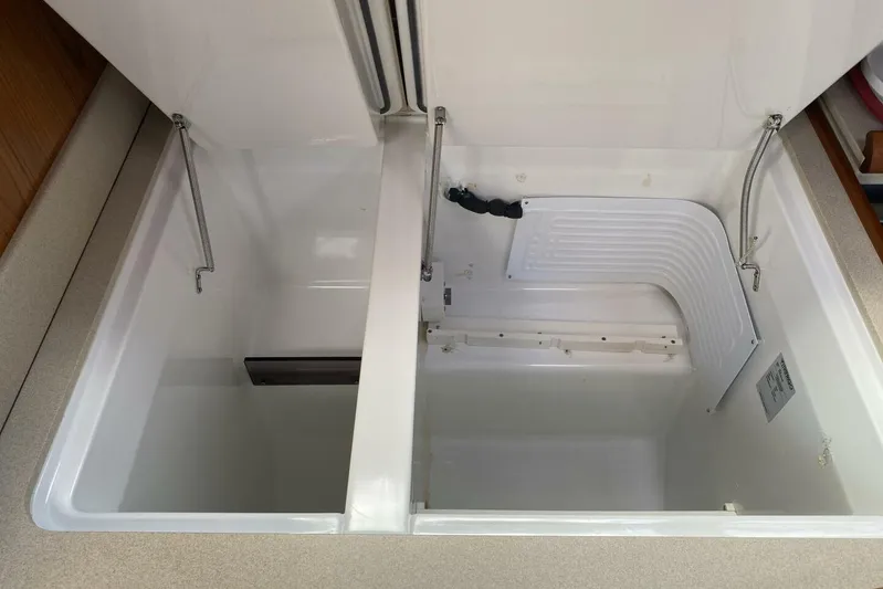 Free Spirits Yacht Photos Pics Open storage compartments on Jeanneau Sun Odyssey 45.2 yacht, 2000 model.