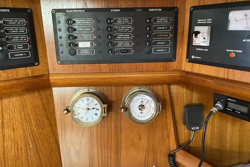 Free Spirits Yacht Photos Pics Control panel of a 2000 Jeanneau Sun Odyssey 45.2 yacht with gauges and switches.