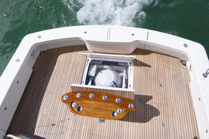 Serenity Now Yacht Photos Pics 2014 Viking 66 Convertible yacht deck with wooden flooring and fishing station.