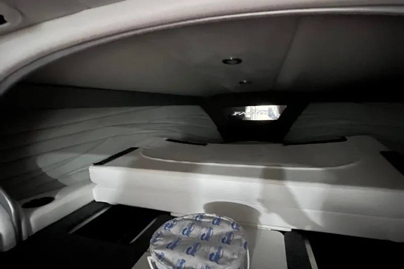 Yacht Photos Pics Interior cabin of 2017 Formula 292 FASTech boat, featuring cushioned seating and sleek design.