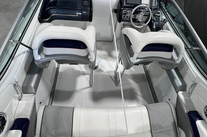  Yacht Photos Pics 2017 Formula 292 FASTech boat interior with white seating and modern dashboard.