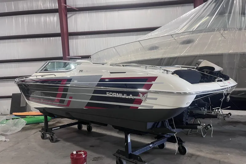  Yacht Photos Pics 2017 Formula 292 FASTech boat in storage, featuring sleek design and vibrant graphics.