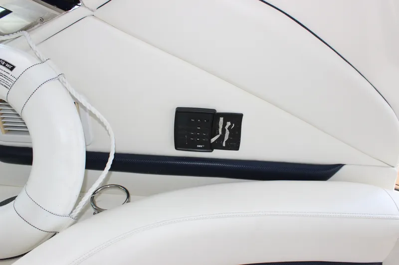  Yacht Photos Pics 2005 Sea Ray 420 Sundancer interior with life preserver and control panel.