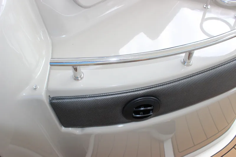  Yacht Photos Pics 2005 Sea Ray 420 Sundancer boat deck with stainless steel railing and black vent.