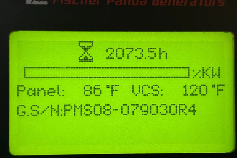 Yacht Photos Pics Display screen showing generator hours and temperatures on a 2013 Pursuit OS 385 Offshore.