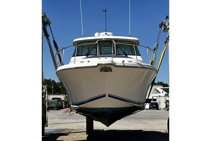  Yacht Photos Pics 2013 Pursuit OS 385 Offshore boat in dry dock, front view.