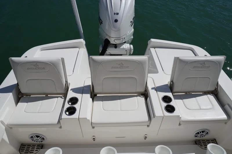  Yacht Photos Pics 2024 Regulator 26XO boat seats with cup holders, showcasing sleek design and comfort.